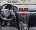 Серый Мазда 3, объемом двигателя 1.6 л и пробегом 250 тыс. км за 4750 $, фото 3 на Automoto.ua