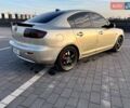 Серый Мазда 3, объемом двигателя 1.6 л и пробегом 265 тыс. км за 4350 $, фото 3 на Automoto.ua
