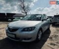 Сірий Мазда 3, об'ємом двигуна 1.6 л та пробігом 296 тис. км за 4400 $, фото 1 на Automoto.ua