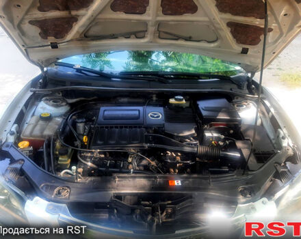 Серый Мазда 3, объемом двигателя 1.6 л и пробегом 270 тыс. км за 4300 $, фото 3 на Automoto.ua