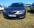 Серый Мазда 3, объемом двигателя 1.6 л и пробегом 390 тыс. км за 3900 $, фото 1 на Automoto.ua