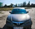 Серый Мазда 3, объемом двигателя 1.6 л и пробегом 196 тыс. км за 5500 $, фото 1 на Automoto.ua