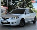 Серый Мазда 3, объемом двигателя 1.6 л и пробегом 135 тыс. км за 6400 $, фото 1 на Automoto.ua