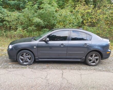 Сірий Мазда 3, об'ємом двигуна 2 л та пробігом 317 тис. км за 3100 $, фото 2 на Automoto.ua