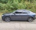 Сірий Мазда 3, об'ємом двигуна 2 л та пробігом 317 тис. км за 3100 $, фото 2 на Automoto.ua