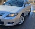Сірий Мазда 3, об'ємом двигуна 1.6 л та пробігом 174 тис. км за 6199 $, фото 1 на Automoto.ua