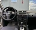 Сірий Мазда 3, об'ємом двигуна 1.6 л та пробігом 255 тис. км за 5699 $, фото 4 на Automoto.ua
