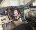 Серый Мазда 3, объемом двигателя 1.6 л и пробегом 173 тыс. км за 2202 $, фото 7 на Automoto.ua