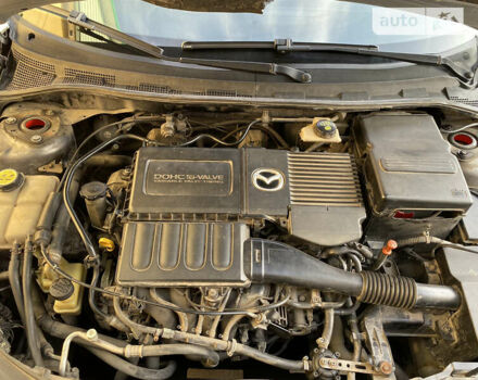 Серый Мазда 3, объемом двигателя 1.6 л и пробегом 269 тыс. км за 5600 $, фото 1 на Automoto.ua