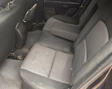 Серый Мазда 3, объемом двигателя 1.6 л и пробегом 196 тыс. км за 6000 $, фото 6 на Automoto.ua