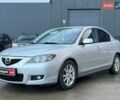 Серый Мазда 3, объемом двигателя 1.6 л и пробегом 305 тыс. км за 5940 $, фото 1 на Automoto.ua