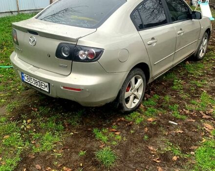 Серый Мазда 3, объемом двигателя 2 л и пробегом 307 тыс. км за 5250 $, фото 2 на Automoto.ua