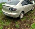 Серый Мазда 3, объемом двигателя 2 л и пробегом 307 тыс. км за 5250 $, фото 2 на Automoto.ua