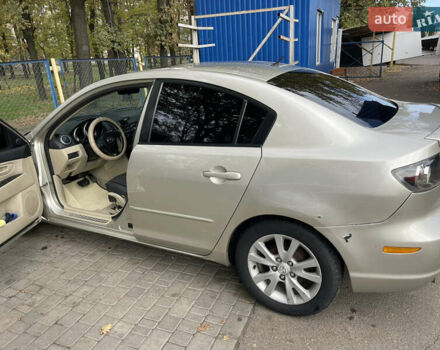 Серый Мазда 3, объемом двигателя 1.6 л и пробегом 170 тыс. км за 5200 $, фото 2 на Automoto.ua