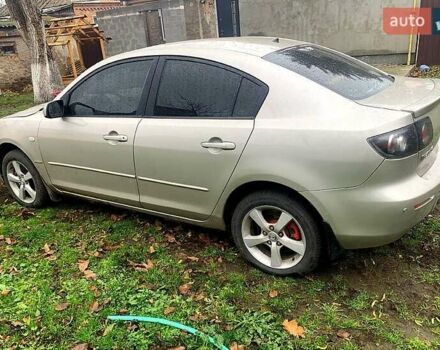 Серый Мазда 3, объемом двигателя 2 л и пробегом 307 тыс. км за 5250 $, фото 2 на Automoto.ua