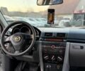 Серый Мазда 3, объемом двигателя 1.6 л и пробегом 232 тыс. км за 5000 $, фото 10 на Automoto.ua