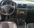 Сірий Мазда 3, об'ємом двигуна 1.6 л та пробігом 242 тис. км за 4400 $, фото 3 на Automoto.ua