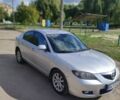 Серый Мазда 3, объемом двигателя 1.6 л и пробегом 242 тыс. км за 4400 $, фото 1 на Automoto.ua