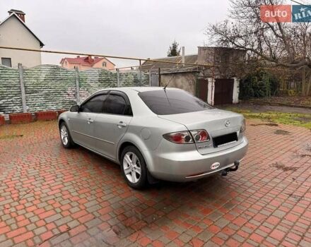 Сірий Мазда 3, об'ємом двигуна 2 л та пробігом 171 тис. км за 5600 $, фото 2 на Automoto.ua