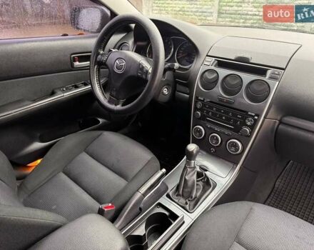 Сірий Мазда 3, об'ємом двигуна 2 л та пробігом 171 тис. км за 5600 $, фото 10 на Automoto.ua