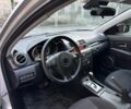 Сірий Мазда 3, об'ємом двигуна 1.6 л та пробігом 205 тис. км за 5700 $, фото 5 на Automoto.ua