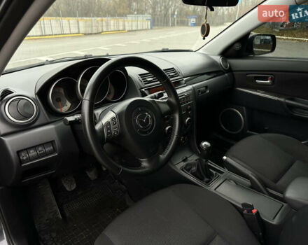 Серый Мазда 3, объемом двигателя 2 л и пробегом 188 тыс. км за 4999 $, фото 17 на Automoto.ua