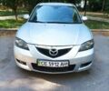 Серый Мазда 3, объемом двигателя 1.6 л и пробегом 225 тыс. км за 3000 $, фото 1 на Automoto.ua