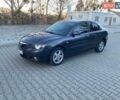 Серый Мазда 3, объемом двигателя 1.6 л и пробегом 170 тыс. км за 5250 $, фото 1 на Automoto.ua