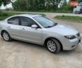 Серый Мазда 3, объемом двигателя 1.6 л и пробегом 285 тыс. км за 5700 $, фото 1 на Automoto.ua