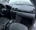 Серый Мазда 3, объемом двигателя 1.6 л и пробегом 300 тыс. км за 3999 $, фото 14 на Automoto.ua