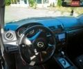 Серый Мазда 3, объемом двигателя 1.6 л и пробегом 196 тыс. км за 5500 $, фото 4 на Automoto.ua