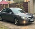 Серый Мазда 3, объемом двигателя 1.6 л и пробегом 242 тыс. км за 5800 $, фото 1 на Automoto.ua