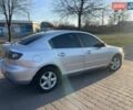 Серый Мазда 3, объемом двигателя 1.6 л и пробегом 235 тыс. км за 5300 $, фото 2 на Automoto.ua