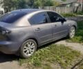 Серый Мазда 3, объемом двигателя 1.6 л и пробегом 157 тыс. км за 4333 $, фото 2 на Automoto.ua