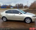 Серый Мазда 3, объемом двигателя 2 л и пробегом 163 тыс. км за 5100 $, фото 1 на Automoto.ua