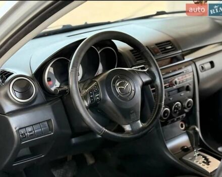 Серый Мазда 3, объемом двигателя 1.6 л и пробегом 135 тыс. км за 6400 $, фото 6 на Automoto.ua