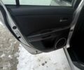 Сірий Мазда 3, об'ємом двигуна 1.6 л та пробігом 230 тис. км за 4700 $, фото 11 на Automoto.ua