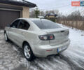 Серый Мазда 3, объемом двигателя 2 л и пробегом 310 тыс. км за 3950 $, фото 1 на Automoto.ua
