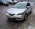 Серый Мазда 3, объемом двигателя 1.6 л и пробегом 225 тыс. км за 3800 $, фото 1 на Automoto.ua