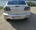 Серый Мазда 3, объемом двигателя 1.6 л и пробегом 228 тыс. км за 5000 $, фото 1 на Automoto.ua