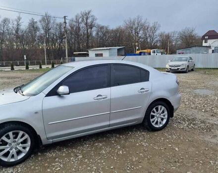 Серый Мазда 3, объемом двигателя 1.6 л и пробегом 223 тыс. км за 3950 $, фото 1 на Automoto.ua