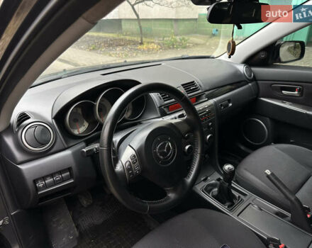 Сірий Мазда 3, об'ємом двигуна 2 л та пробігом 189 тис. км за 4750 $, фото 20 на Automoto.ua