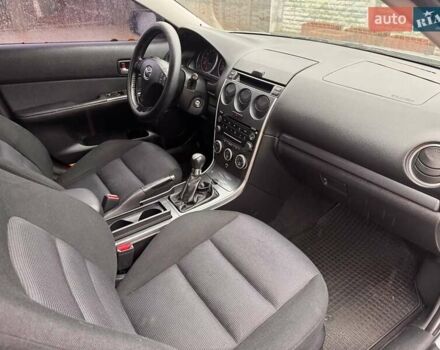 Сірий Мазда 3, об'ємом двигуна 2 л та пробігом 171 тис. км за 5600 $, фото 9 на Automoto.ua