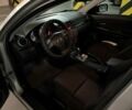 Серый Мазда 3, объемом двигателя 1.6 л и пробегом 169 тыс. км за 5699 $, фото 5 на Automoto.ua