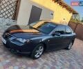 Серый Мазда 3, объемом двигателя 1.6 л и пробегом 196 тыс. км за 6000 $, фото 1 на Automoto.ua