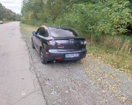 Сірий Мазда 3, об'ємом двигуна 2 л та пробігом 317 тис. км за 3100 $, фото 1 на Automoto.ua