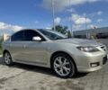 Серый Мазда 3, объемом двигателя 2 л и пробегом 182 тыс. км за 6100 $, фото 1 на Automoto.ua