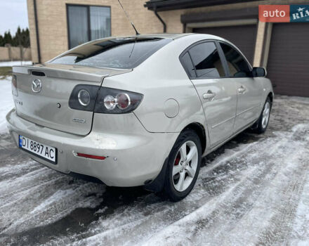 Серый Мазда 3, объемом двигателя 2 л и пробегом 310 тыс. км за 3950 $, фото 2 на Automoto.ua