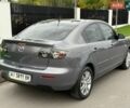 Серый Мазда 3, объемом двигателя 1.6 л и пробегом 125 тыс. км за 6550 $, фото 5 на Automoto.ua