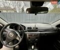 Сірий Мазда 3, об'ємом двигуна 1.6 л та пробігом 286 тис. км за 4800 $, фото 14 на Automoto.ua